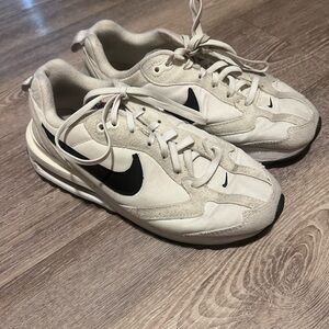 Nike Cream and Black Athletic Shoes